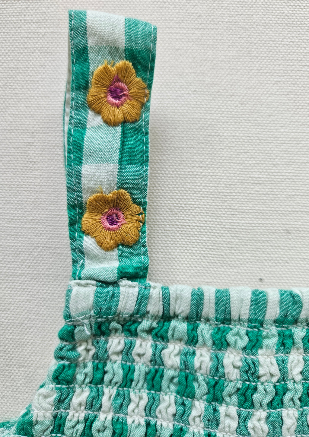 NEXT Mädchen Jumpsuit mit Sonnenblumen & Karomuster | Gr. 116