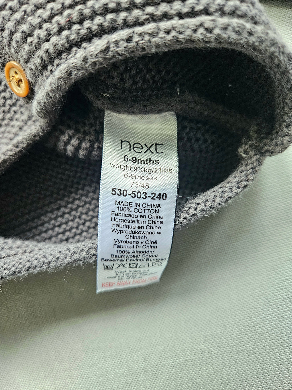 Next Strickjacke mit Kapuze in Grau | Gr. 74